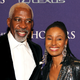 In this file photo, Dan Gasby and B. Smith attend BET Honors 2013 at Warner Theatre on January 12, 2013 in Washington, DC.